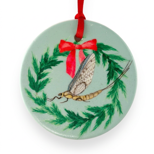 The Fish Fly ceramic Christmas ornament close-up on white background, by TWAL