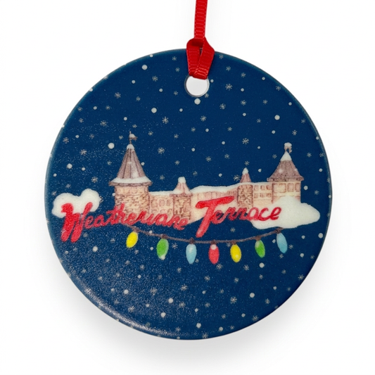 The Weathervane ceramic Christmas ornament close-up on white background