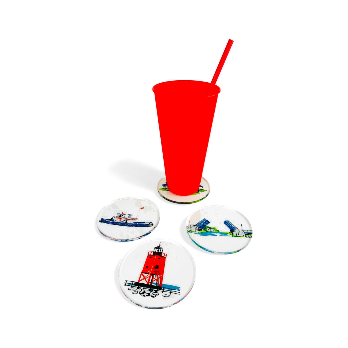 TWAL Charlevoix lucite coasters in use, with a red cup on one coaster