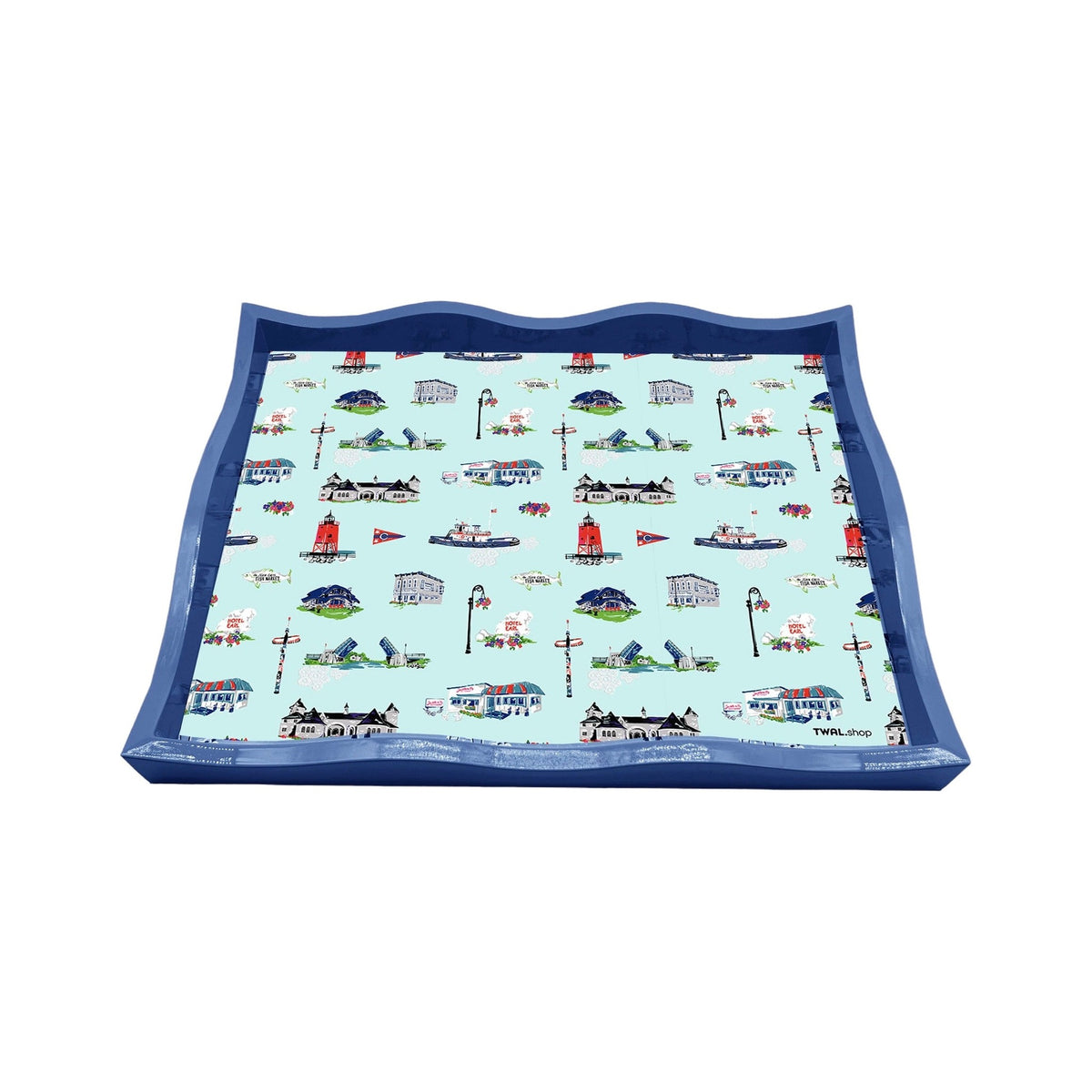 Large blue lacquer tray by TWAL with a scalloped edge, printed with the Charlevoix toile pattern of local landmarks, including the South Pier Lighthouse, drawbridge, tug boats and cottages, on light blue, Charlevoix Pop Art Collection