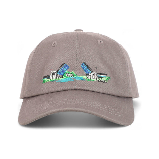 Front of the Drawbridge regular fit cotton baseball cap by TWAL in Petoskey Gray, with the embroidered Drawbridge design, Charlevoix Pop Art Collection