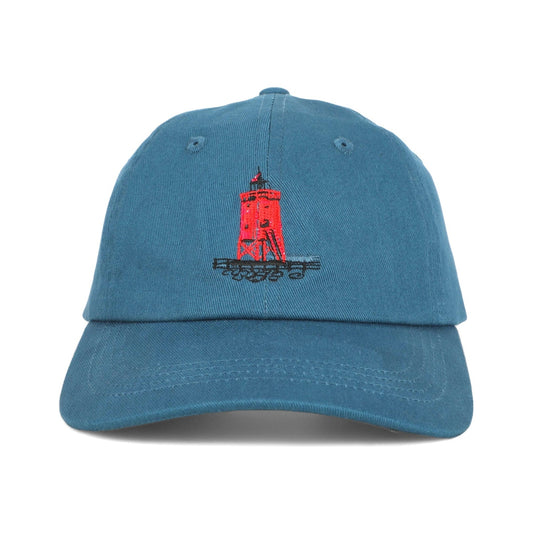 Front of the South Pier Lighthouse regular fit cotton baseball cap by TWAL in Great Lakes Blue, with the embroidered South Pier Lighthouse design, Charlevoix Pop Art Collection