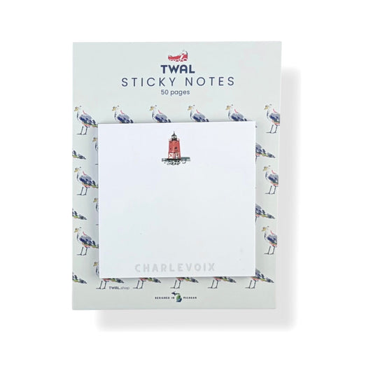 South Pier Lighthouse sticky note pad by TWAL on its seagull-print backing card, Charlevoix Pop Art Collection