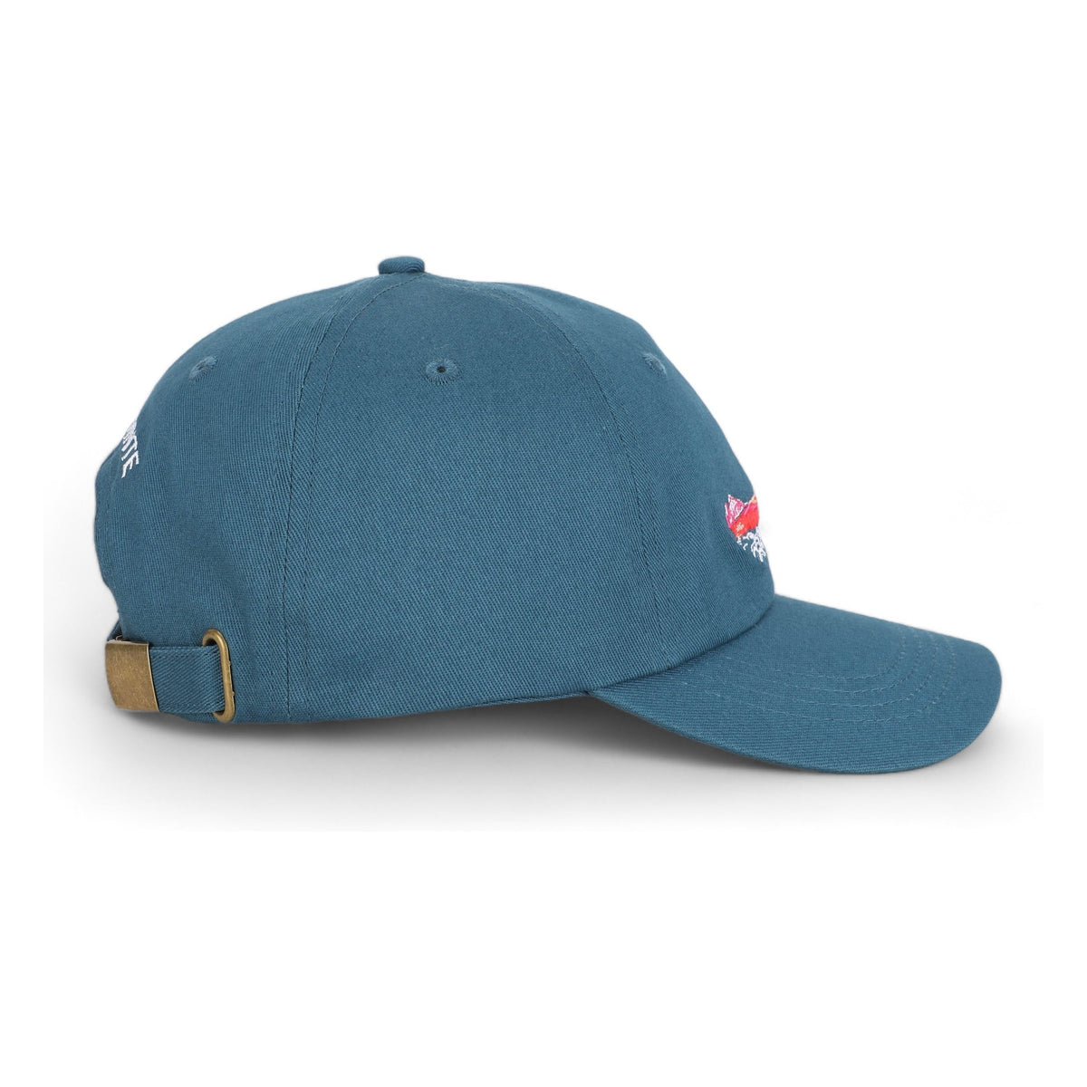Side view of the Freighter regular fit cotton baseball cap by TWAL in Great Lakes Blue, showing the adjustable strap with brass clasp