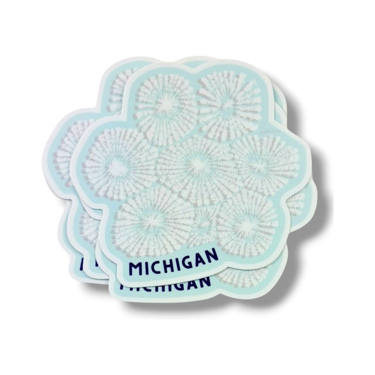 Stack of Petoskey Stone 3-inch vinyl stickers by TWAL