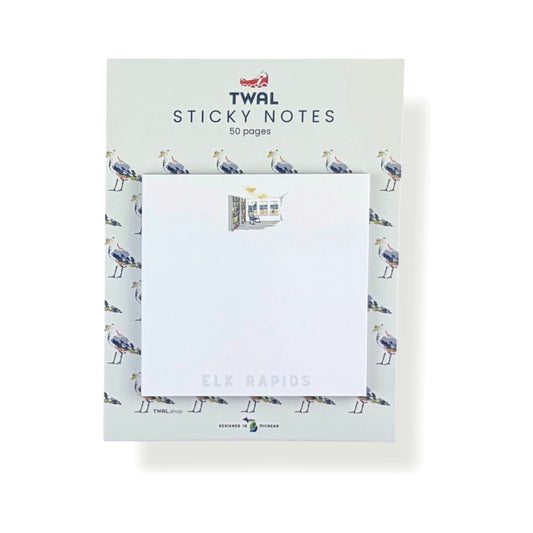 Elk Rapids Island House sticky note pad by TWAL on its seagull-print backing card, Up North Pop Art Collection