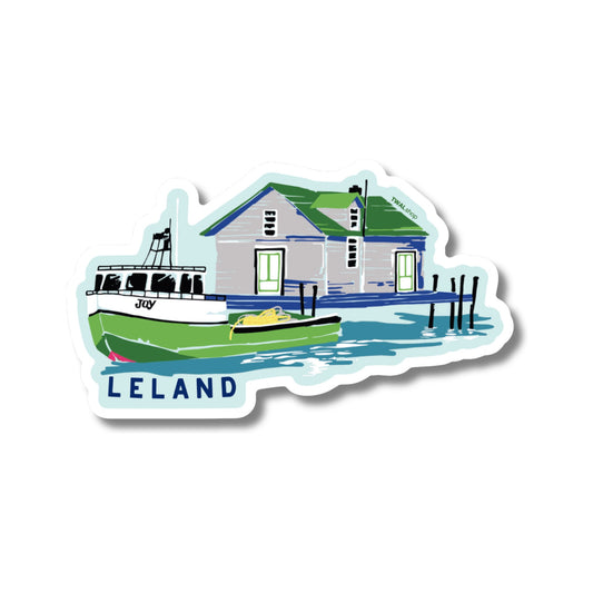 Leland Fishtown vinyl sticker by TWAL: a gray Fishtown shanty with a green roof and a green fishing tug at the dock, Up North Pop Art Collection